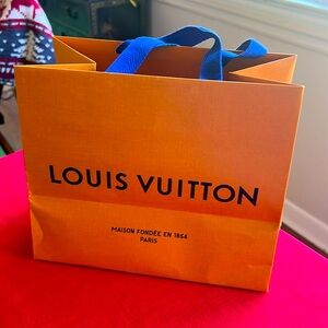 LV paper gift bag. 10 by 8.25 by 6 inches